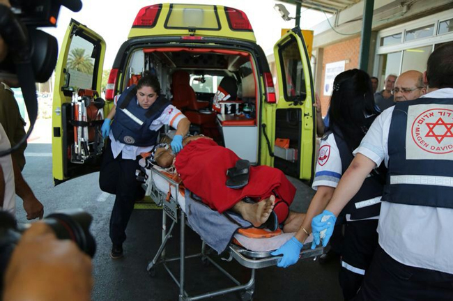 MDA Paramedic Sarah Cascella needed to don a flak jacket while treating a rocket-attack victim under fire during Operation Protective Edge.